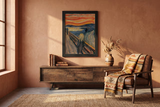 The Scream full bleed print in a black frame in a southwestern style room