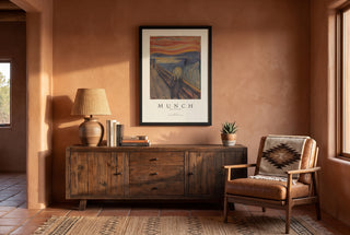 The Scream gallery poster print in a black frame in a southwestern style room