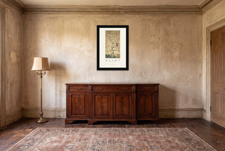 The Tree of Life gallery poster print in a black frame in a vintage style room